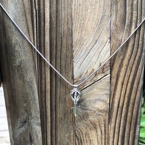 18” silver plated pearl cagewith fresh water pearl